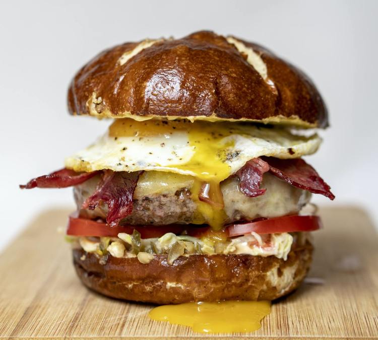 Bacon and Egg Cheeseburger on a Pretzel Bun